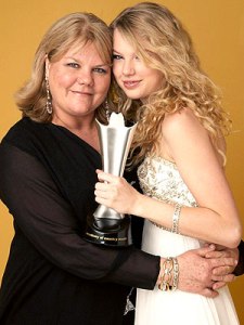 Taylor Swift smiles with her mother after winning at the 43rd annual Academy of Country Music Awards. Swift's mother has been diagnosed for with cancer, but the family is not disclosing any other information at this time. Photo Credit: People Magazine